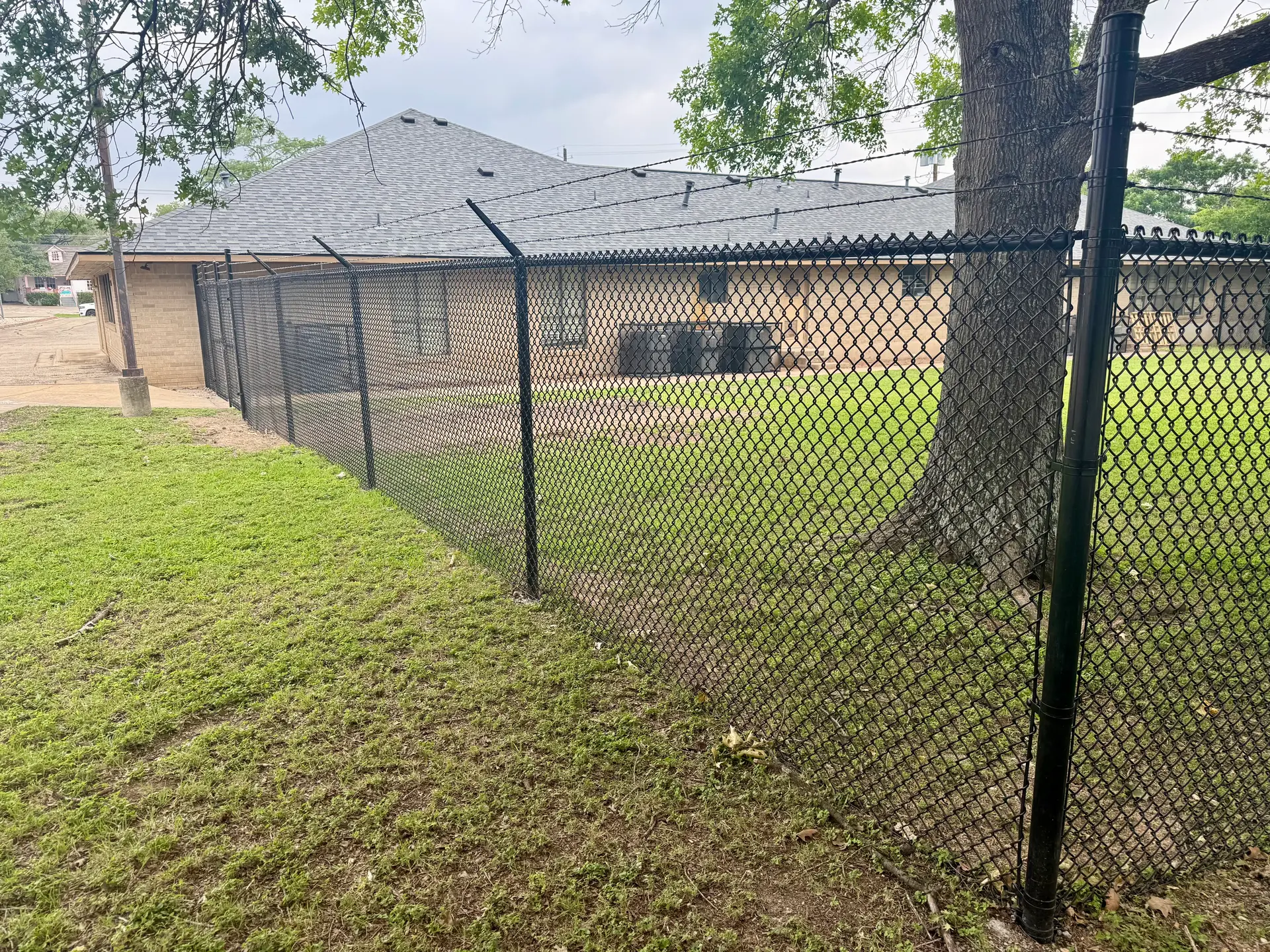 Black chain-link commercial security fence